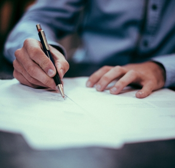 Man writing with a pen